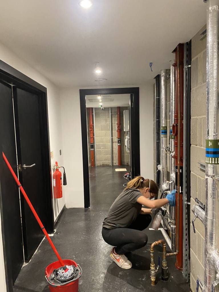Commercial builders clean team working at height on a site in London
