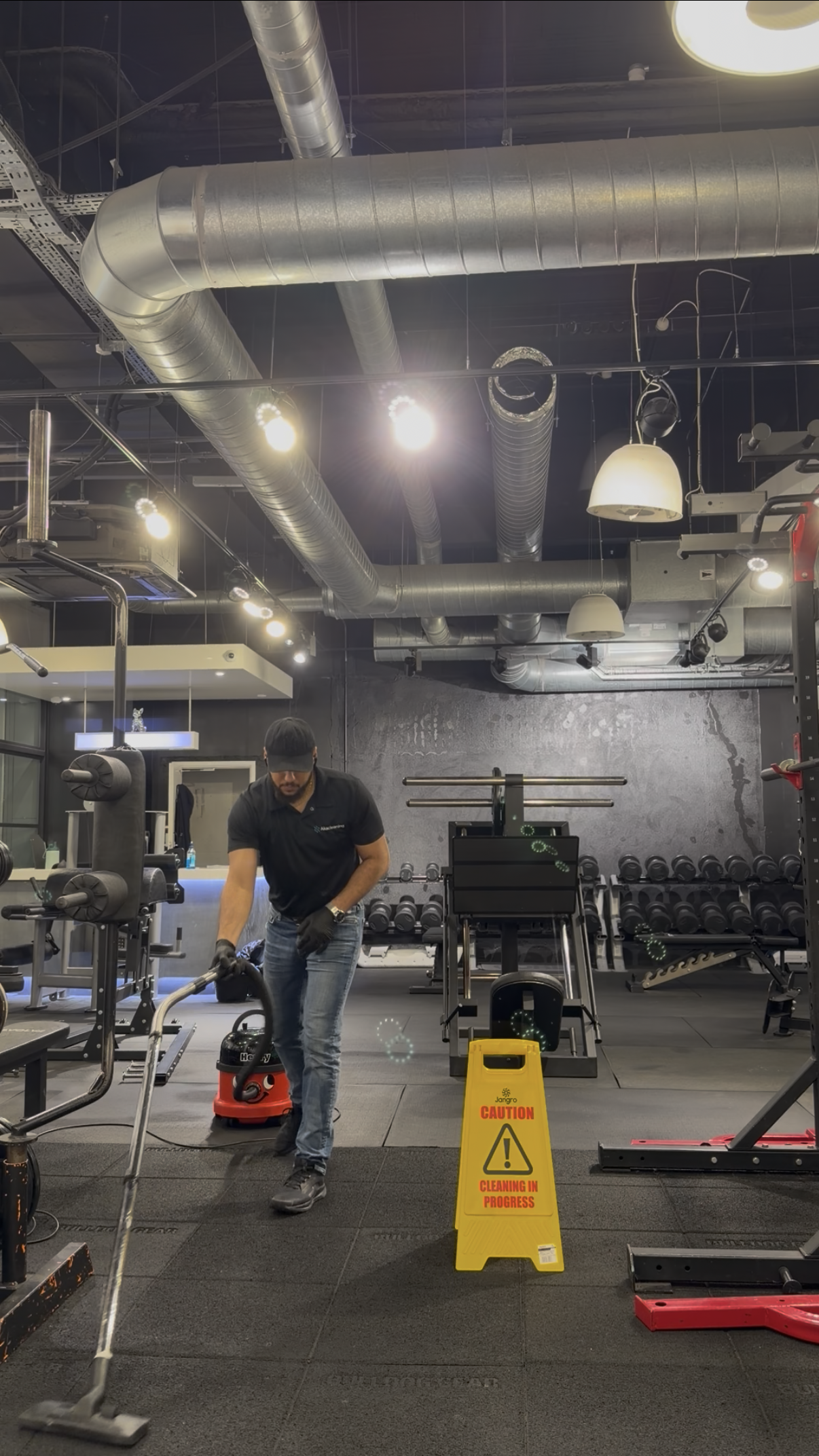 Akacleaning Ltd operative carrying out commercial floor cleaning in a London workspace